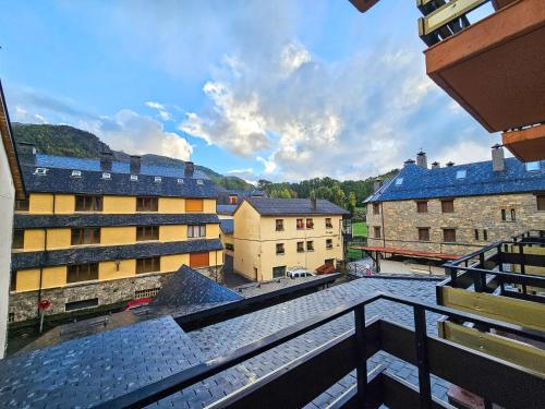 a view of a city from the balcony of a building at Hotel Casa Morlans 3000 in Panticosa