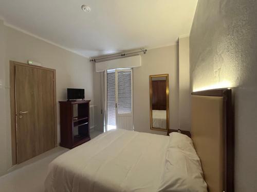 Letto o letti in una camera di Hotel Ristorante StellAmiata