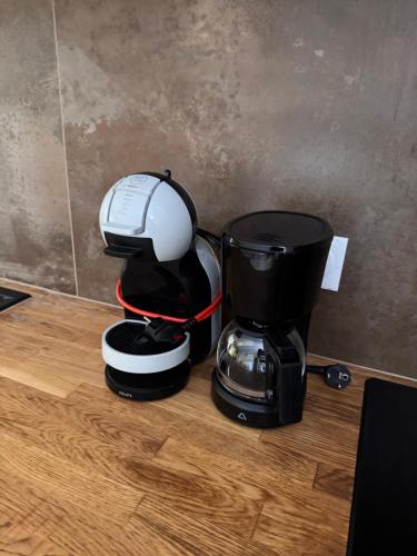 a coffee maker sitting on top of a counter at Apartament cozy in Villerupt