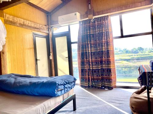 Χώρος καθιστικού στο Du Gia Yên Homestay
