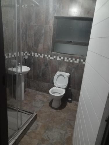 Ένα μπάνιο στο Elangeni Guest House