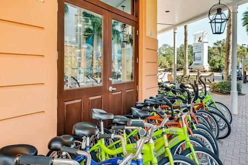a row of bikes parked outside of a building at Deja Vu at Carillon in Carillon Beach
