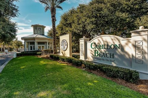 a sign at the entrance to a plantation beach resort at Deja Vu at Carillon in Carillon Beach