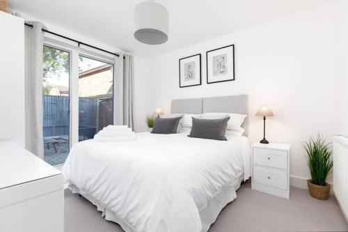 Ένα ή περισσότερα κρεβάτια σε δωμάτιο στο Ground Floor Apartment in Cambridge