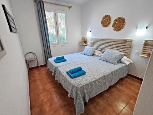 Postel nebo postele na pokoji v ubytování Apartamento Menorca Arenal d'en Castell