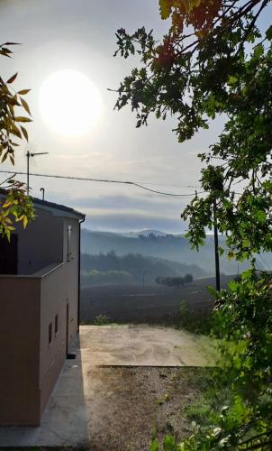 a view from a house with a view of a field at Casa rustica con vista meravigliosa in Offida