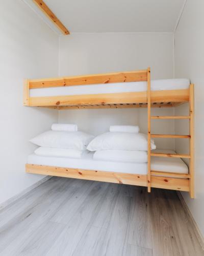 a couple of bunk beds in a room at Domki Wrocław in Wrocław