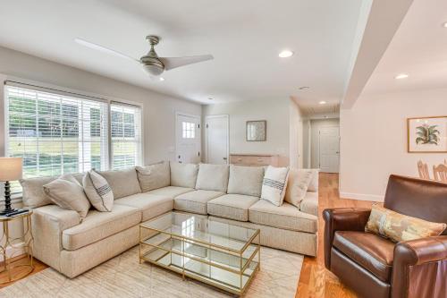 a living room with a couch and a table at Lake Keowee Home with Boat Dock in Seneca in Seneca