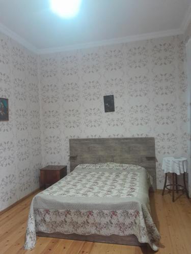 Ένα ή περισσότερα κρεβάτια σε δωμάτιο στο Guest house Mekvena