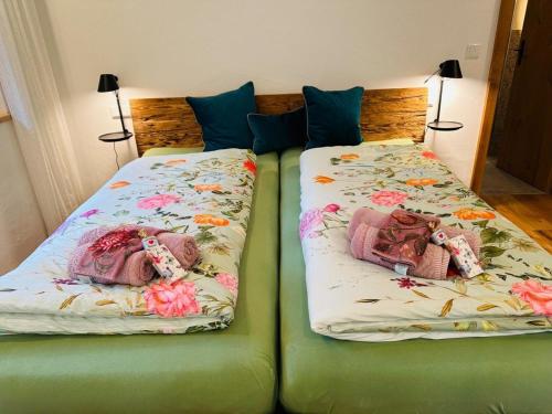 Katil atau katil-katil dalam bilik di Chalet22 beim Flößerhaus in Beuerberg