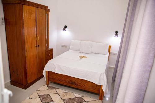 Postel nebo postele na pokoji v ubytování KKJ House