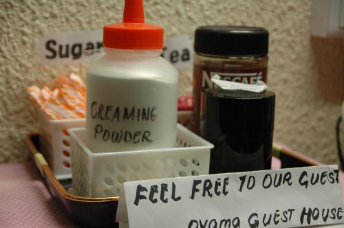 a close up of a bottle of milk and other products at Oyama Guesthouse Kyoto in Kyoto