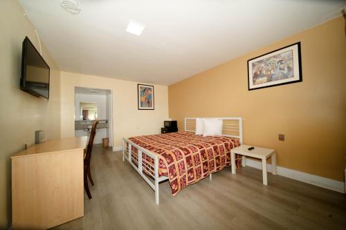 Postel nebo postele na pokoji v ubytování Sinbad Motel