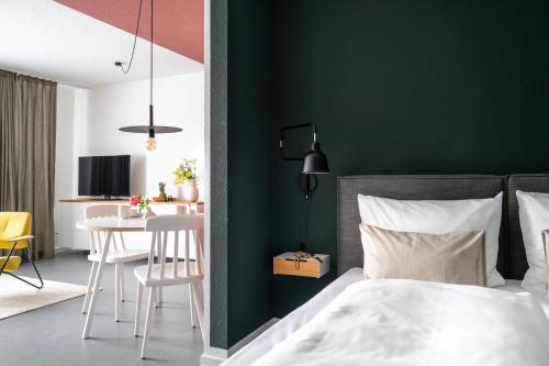 Ένα ή περισσότερα κρεβάτια σε δωμάτιο στο BodenseeApartment Nest