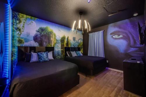 a bedroom with two beds and a painting on the wall at EPIC 12 Bedroom Home with Private Pool in Kissimmee