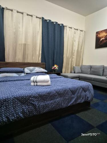 Postel nebo postele na pokoji v ubytování Ghurfati