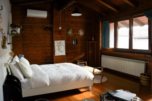Ένα ή περισσότερα κρεβάτια σε δωμάτιο στο B&B Casa Ottavia Boutique Rooms