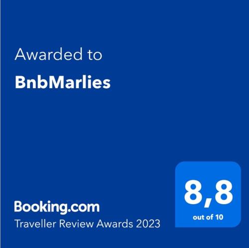 a screenshot of a cell phone with the text awarded to bbn mattias traveller at BnbMarlies in Oorsbeek