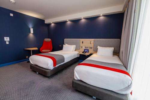 Кровать или кровати в номере Holiday Inn Express - Manchester - TRAFFORDCITY by IHG