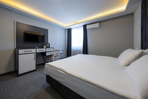 Katil atau katil-katil dalam bilik di Maltepe MANHATTAN OTEL