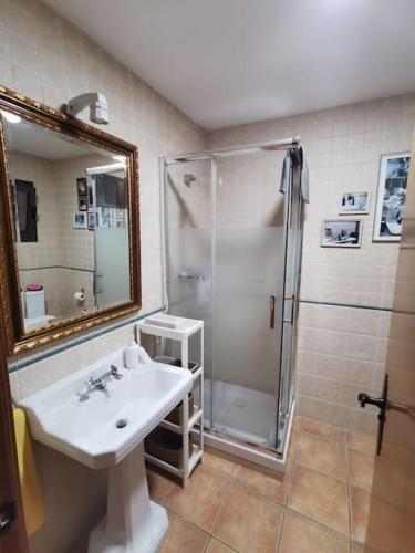 a bathroom with a sink and a shower at Ca l'Herminia in Gironella
