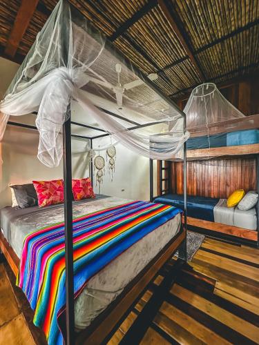 Cama o camas de una habitación en Selva Madre Eco-Sanctuary