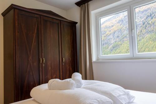 Posteľ alebo postele v izbe v ubytovaní International House Sölden Apartment mit Terrasse ZW 9