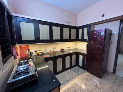 Una cocina o cocineta en 2BHK Residence - Prime Location - Entire House
