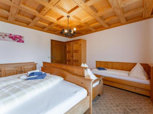 Postel nebo postele na pokoji v ubytování Chalet Sandra