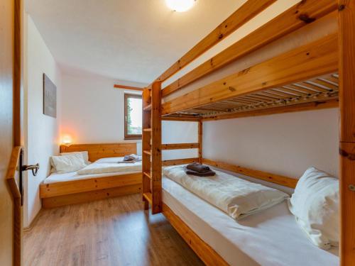 Postel nebo postele na pokoji v ubytování Chalet Sandra