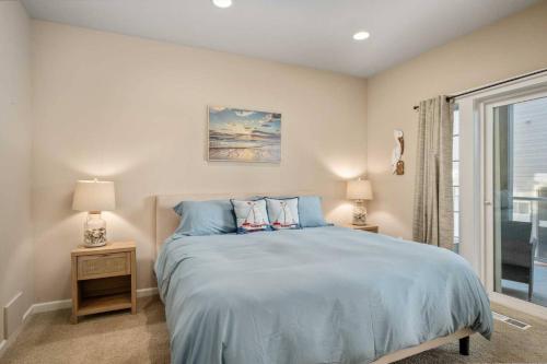 Ένα ή περισσότερα κρεβάτια σε δωμάτιο στο Sea La Vie.