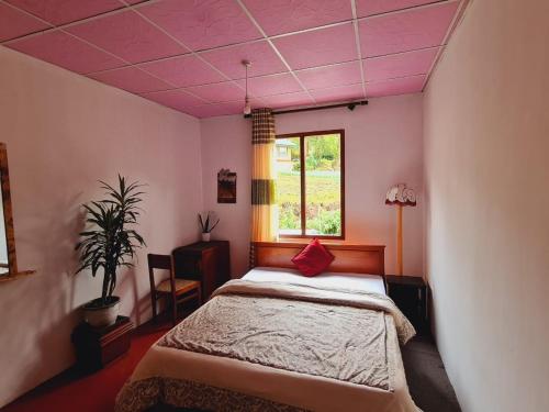 Postel nebo postele na pokoji v ubytování sasru holiday home