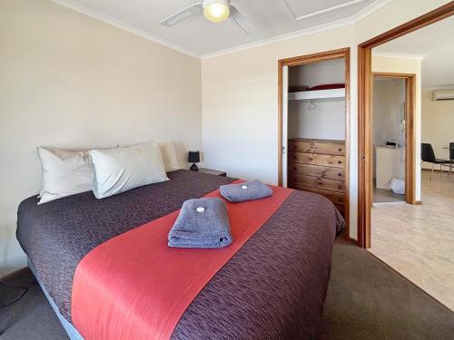 Postel nebo postele na pokoji v ubytování Outback Villas