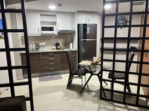 Kuchyň nebo kuchyňský kout v ubytování Puerto Santa Ana Suites Guayaquil