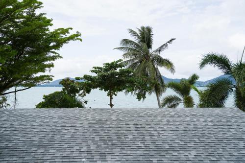 a view of the ocean from a roof at Davina Beach Homes in Panwa Beach