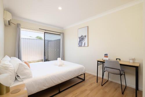 Ένα ή περισσότερα κρεβάτια σε δωμάτιο στο Smart Suites Self Check-in Apartments - S Stockport