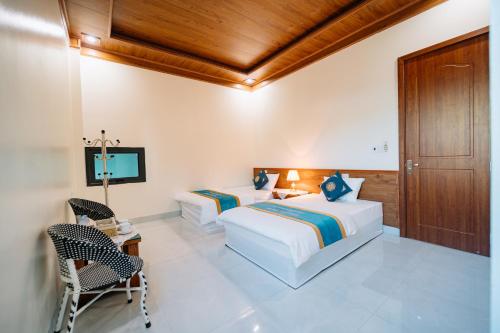 Katil atau katil-katil dalam bilik di HG Hostel provide Tours & Motorbikes