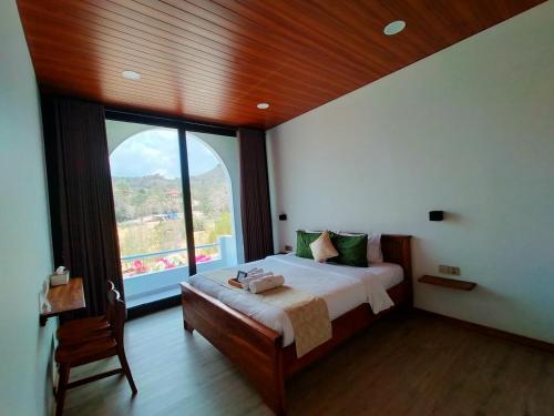 Krevet ili kreveti u jedinici u okviru objekta Losbaba Komodo Villa