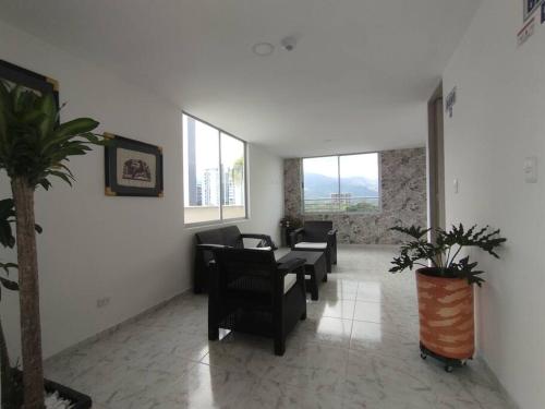 Χώρος καθιστικού στο Hermoso apartamento en el mejor sector de Armenia