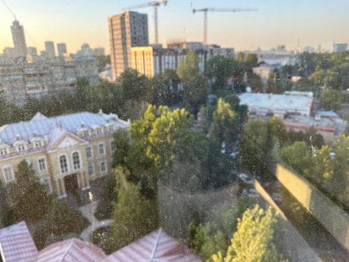 a view of a city from a window at Superb loft Tashkent downtown in Tashkent