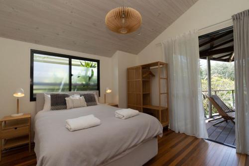 Postel nebo postele na pokoji v ubytování Byron Bay Accom 8 South Beach Lane Riverhouse