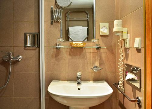 Koupelna v ubytování Hotel Olympik