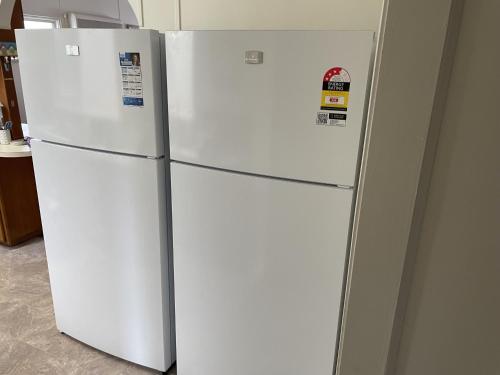 two white refrigerators are standing next to each other at The Sabble Shak in Capel Sound