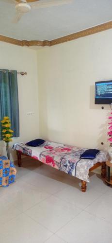 Кровать или кровати в номере Dreams home estate stay coorg B