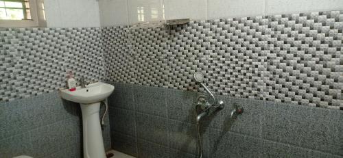Ванная комната в Dreams home estate stay coorg B