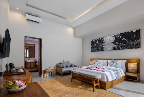 Postel nebo postele na pokoji v ubytování Bhumi Sangtu Ubud
