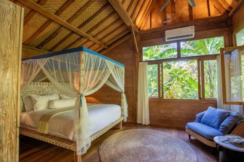 Ένα ή περισσότερα κρεβάτια σε δωμάτιο στο Ananda Villas Bali