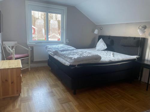 Postel nebo postele na pokoji v ubytování Strandvägen 4