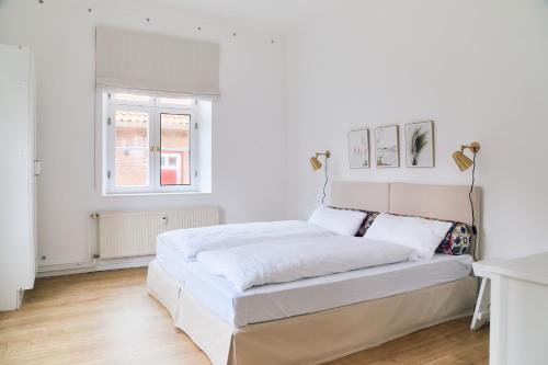 Postel nebo postele na pokoji v ubytování Gartenappartment