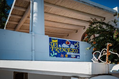 a banner on the side of a building at Eunymos Panarea in Panarea